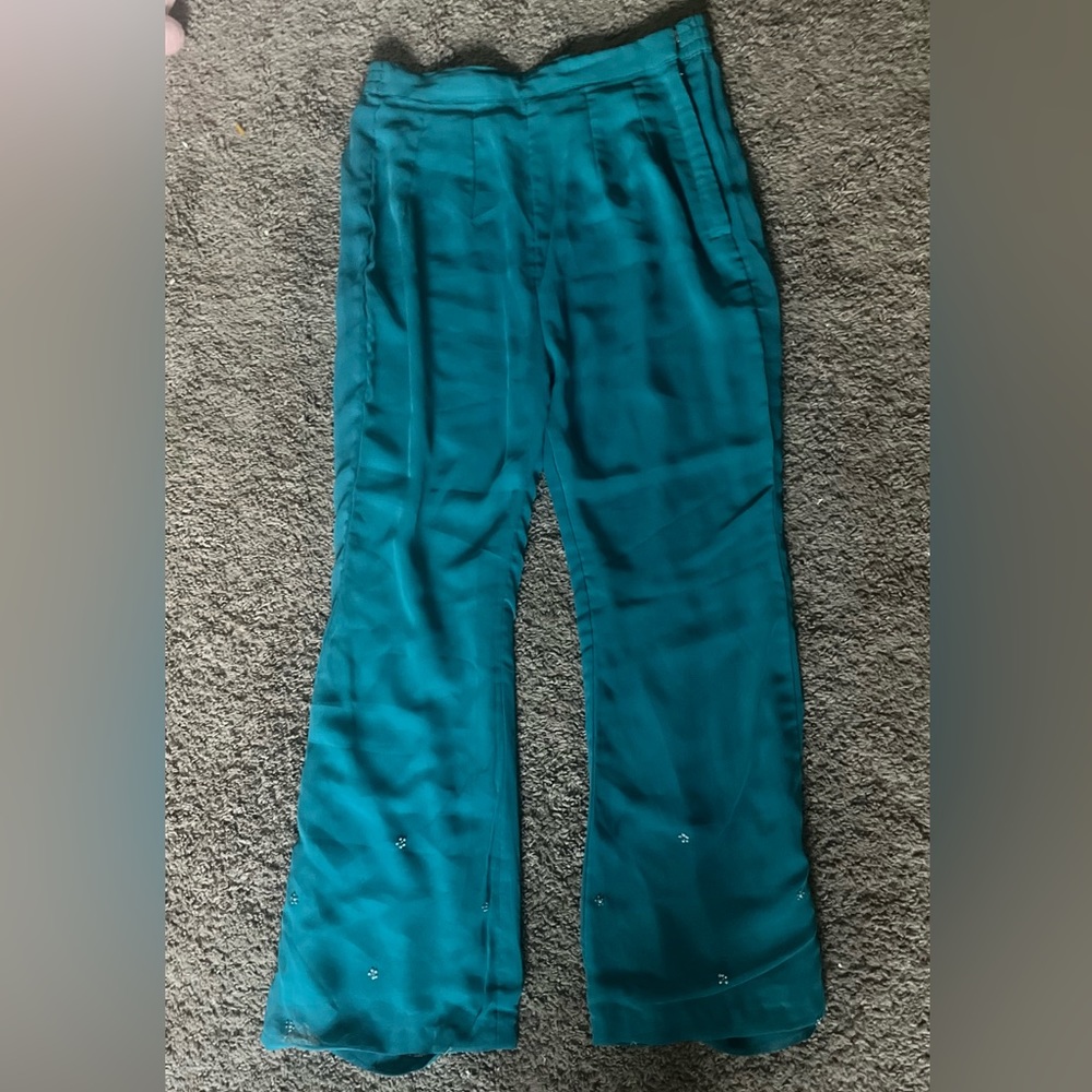 Teal blue pants with bead decoration